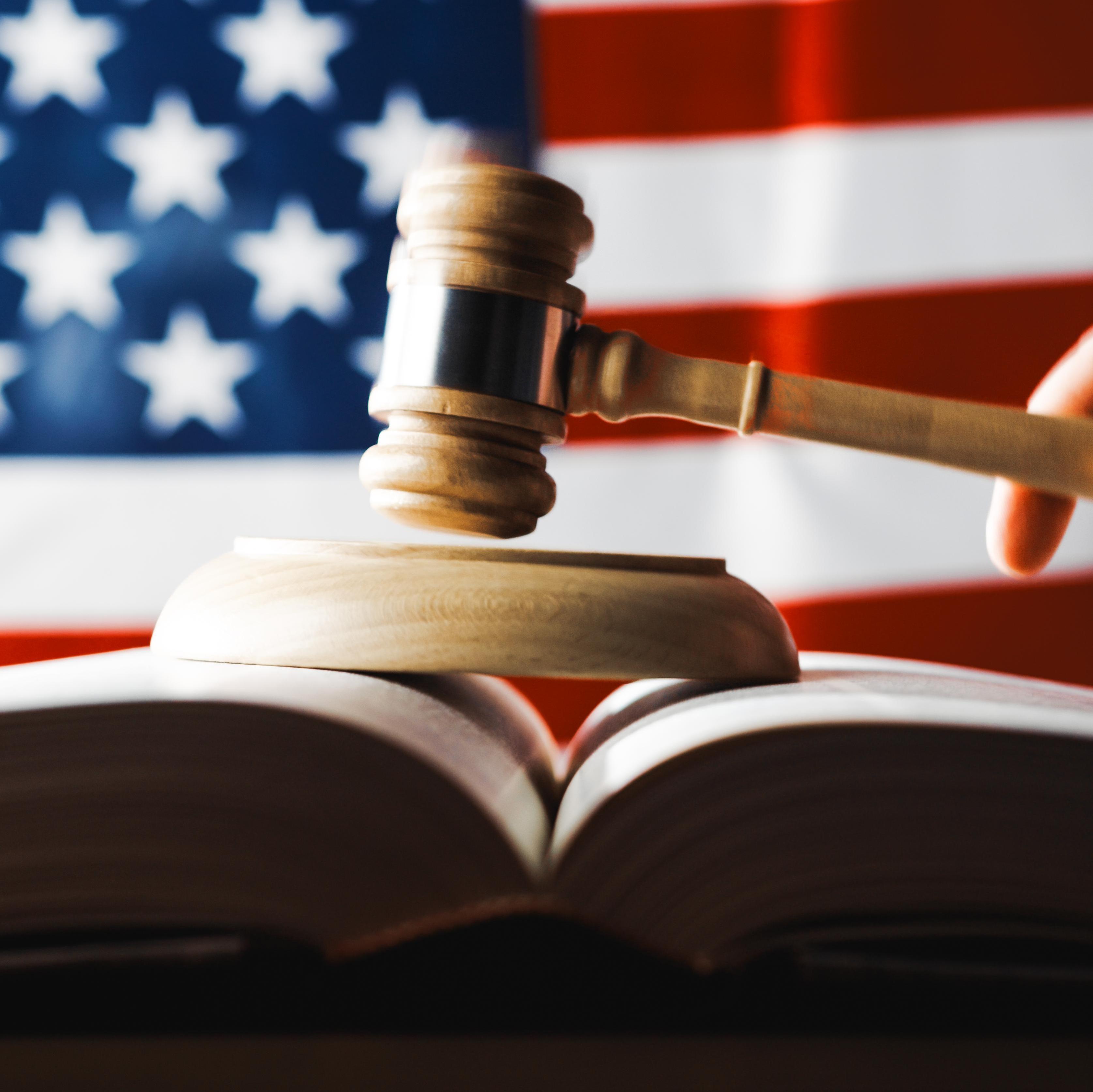 American law symbol with gavel, Bible and the US flag
