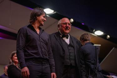 NIC student Sam Mirkin, left, stands onstage with NIC Adjunct Music Professor Stan McDaniel at NIC’s Choral Kaleidoscope concert on March 5 at the Boswell Hall Schuler Performing Arts Center on NIC’s Coeur d’Alene campus.