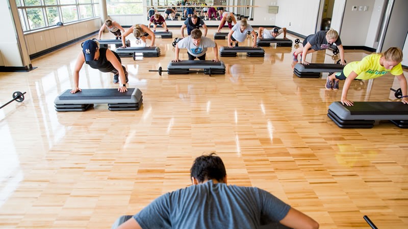 Wellness class - group doing pushups