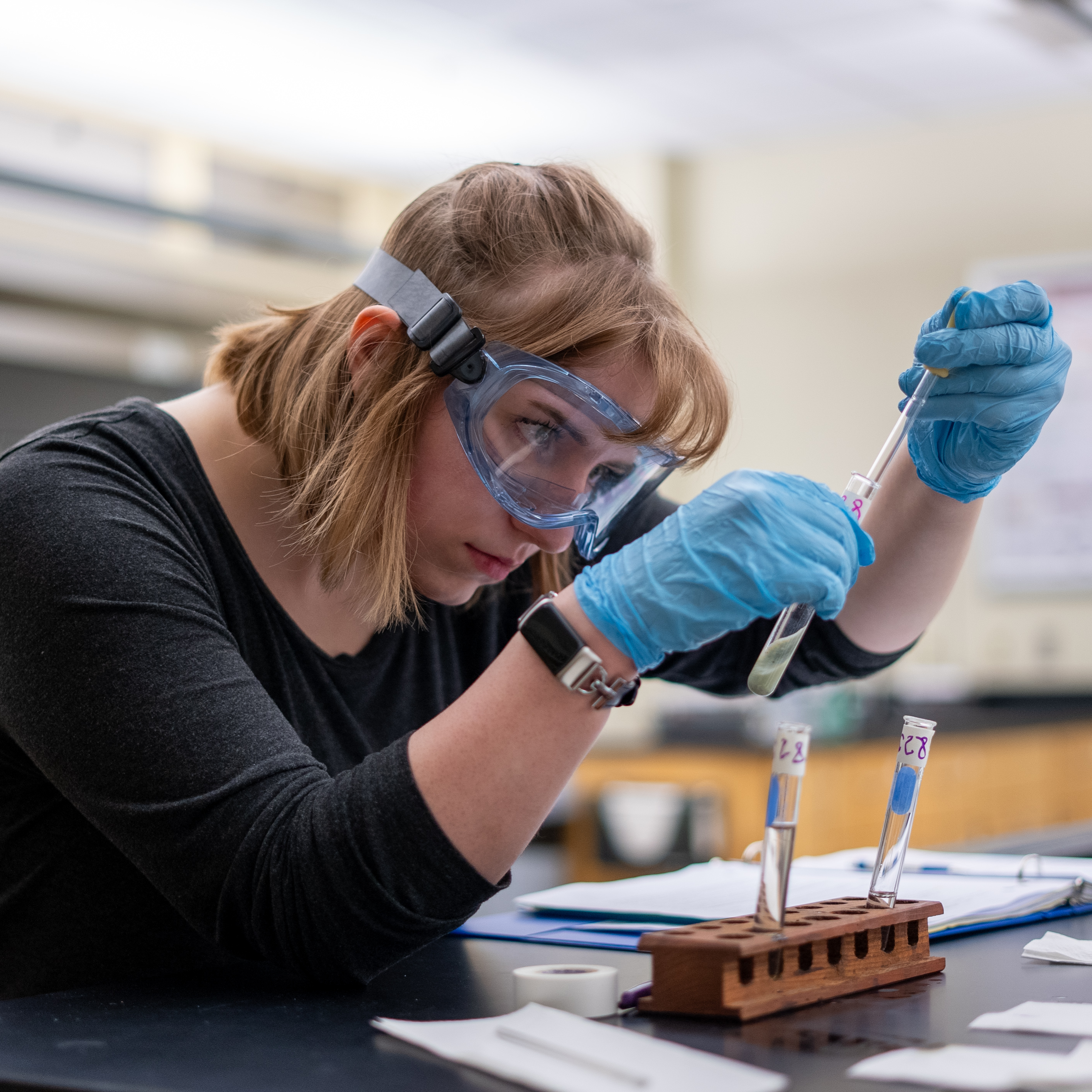 Chemistry Lab, female student working with test tubes