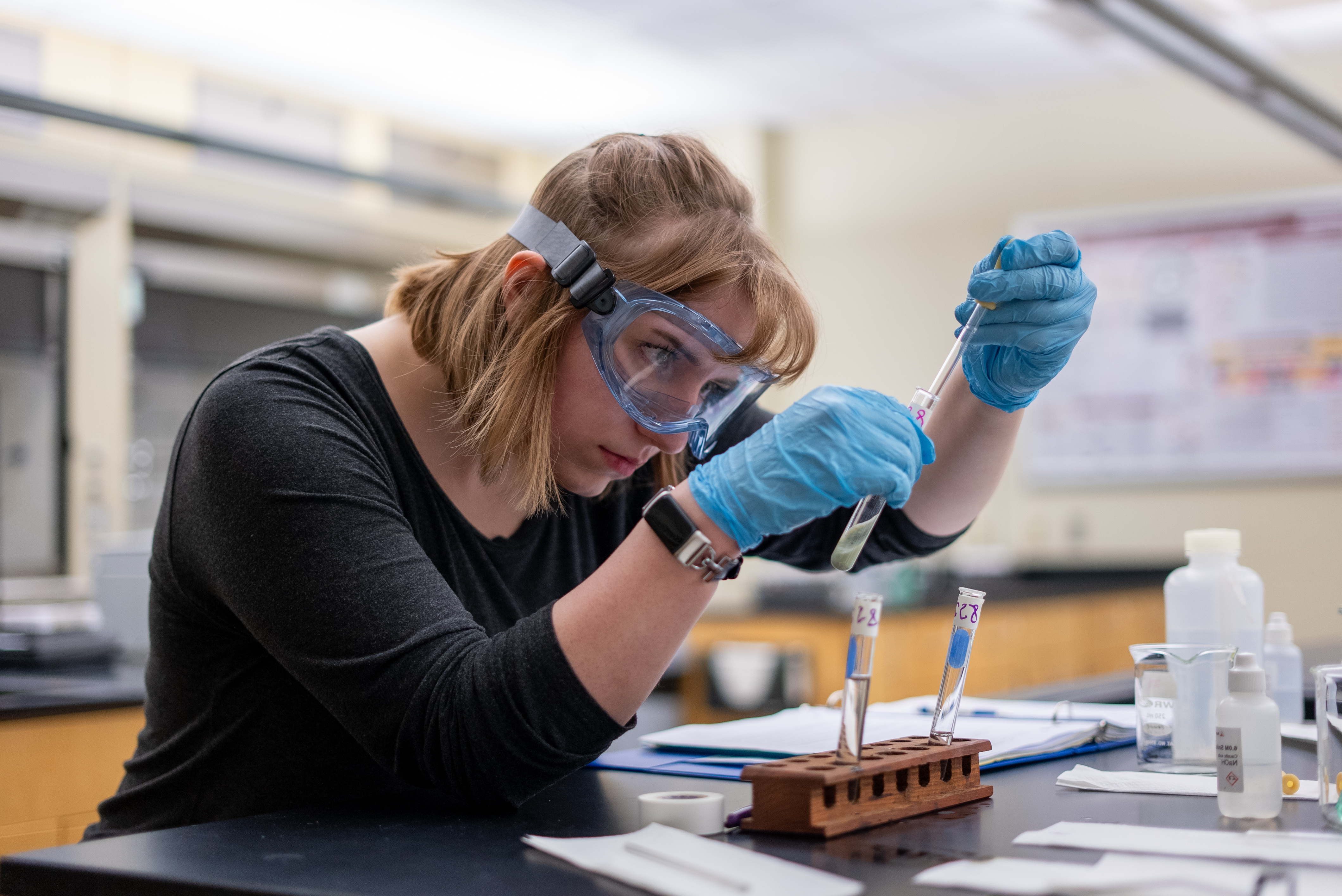 Chemistry Lab, female student working with test tubes