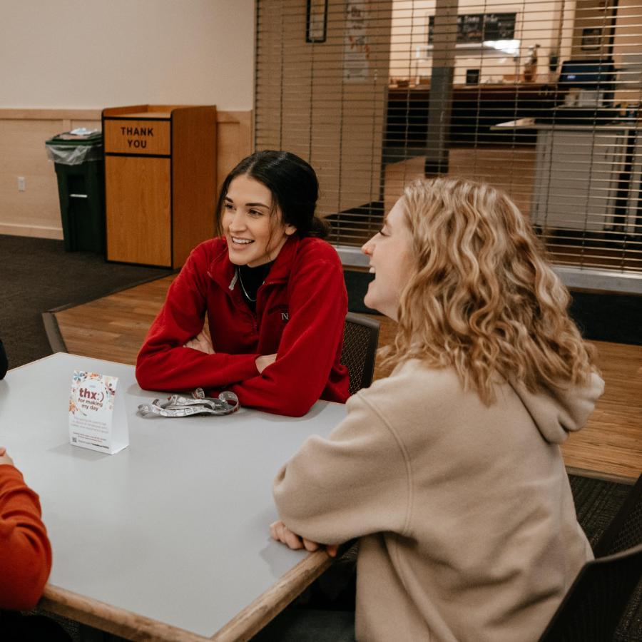 900x900 Students at Dining Hall sitting at table