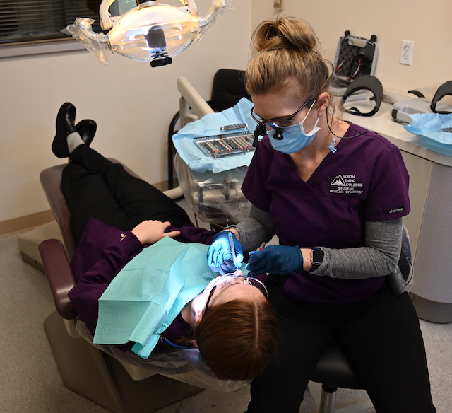 Dental Health Students practicing in a dental lab