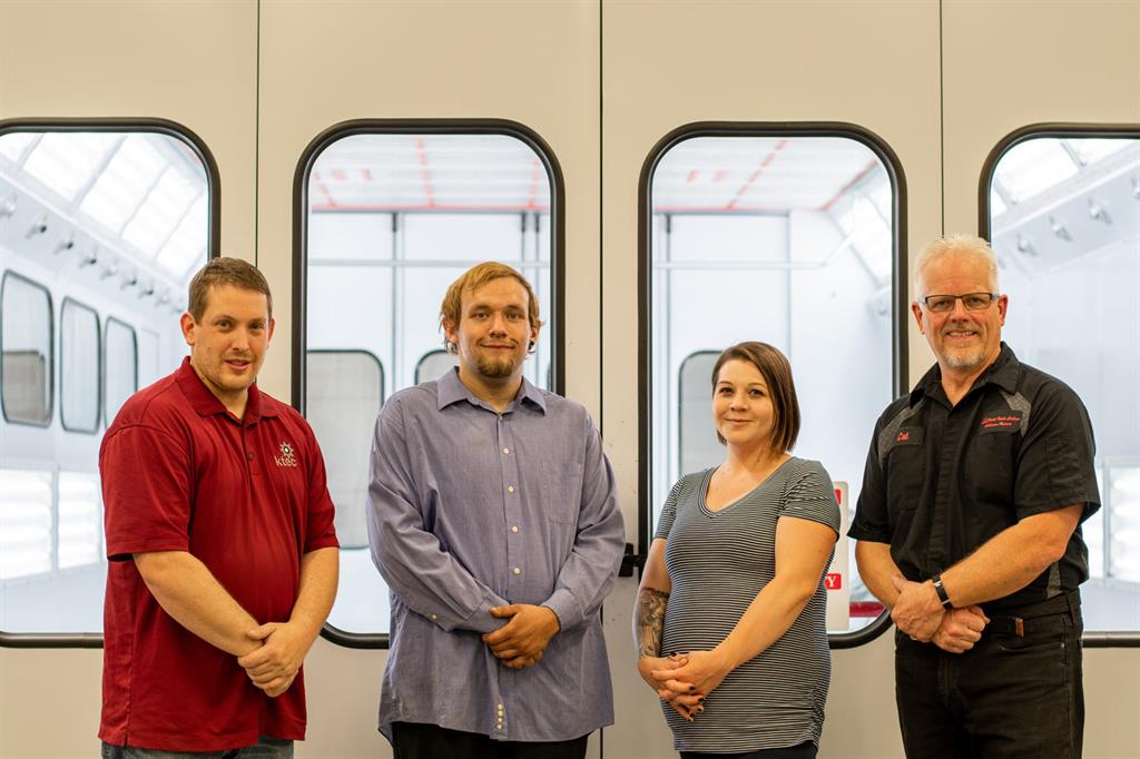 NIC students who won medals in the 2021 SkillsUSA national championships pose for a photo with some of their instructors