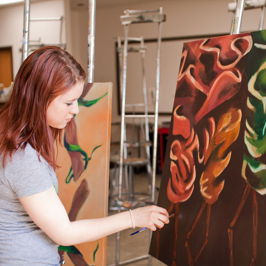 Female student painting flowers