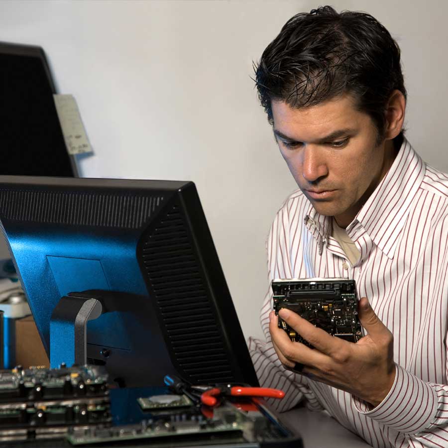 Computer Information Tech working on computer