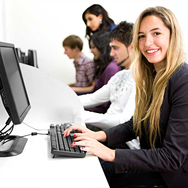 Student learning about office technology in class